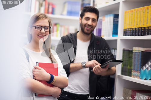 Image of students group  in school  library