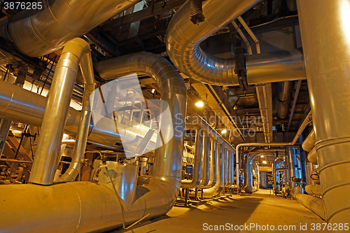 Image of Equipment, cables and piping as found inside of a modern industr