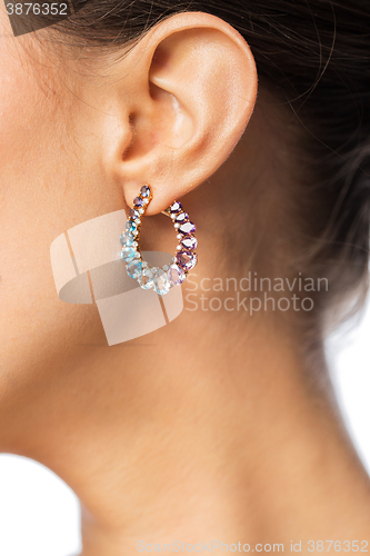 Image of close up of beautiful woman face with earring