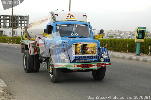 Image of Old truck with arabian people on Hurghada street