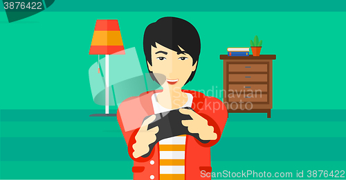 Image of Man playing video game.