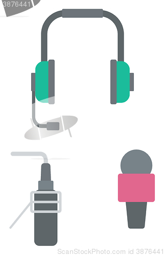 Image of Headphones, classic microphone and studio microphone