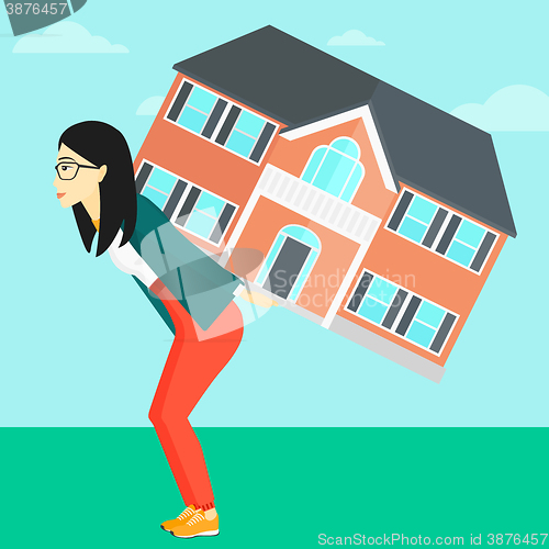 Image of Woman carrying house.