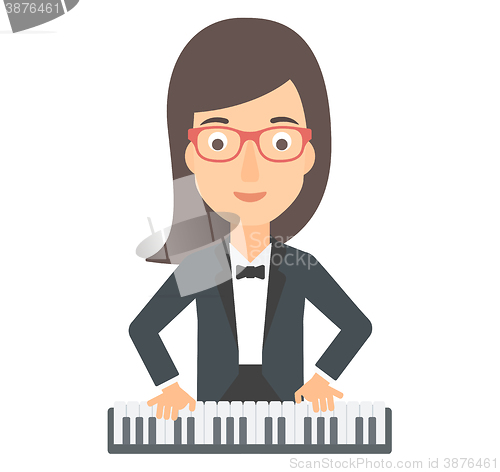 Image of Woman playing piano.