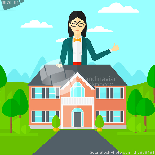 Image of Real estate agent showing thumb up.