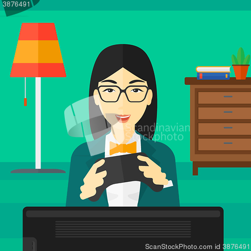 Image of Woman playing video game.