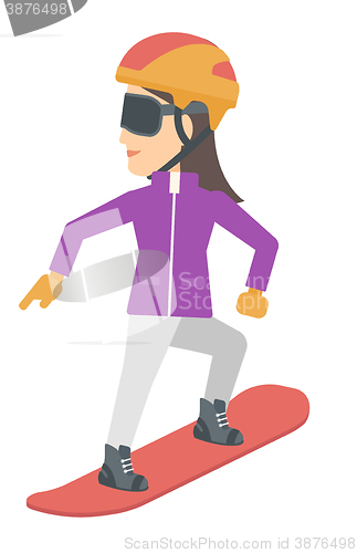 Image of Young woman snowboarding.