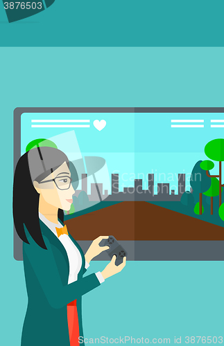 Image of Woman playing video game.