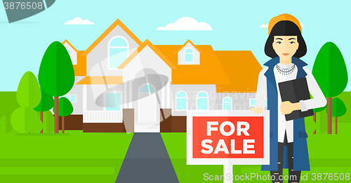 Image of Real estate agent offering house.