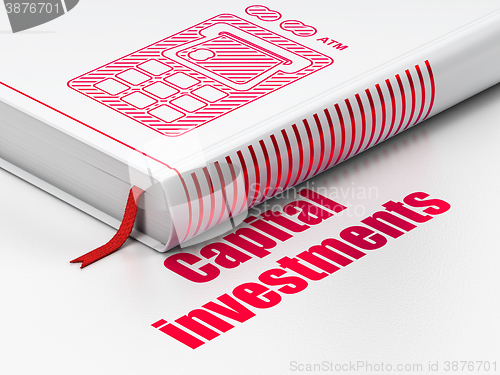 Image of Currency concept: book ATM Machine, Capital Investments on white background