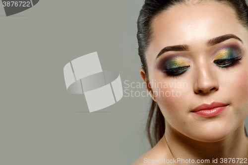 Image of Close up portrait of beautiful young woman face. Makeup concept.