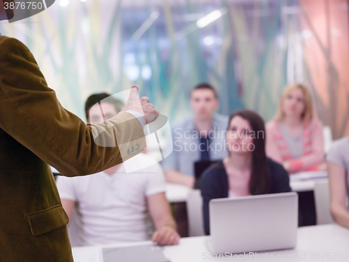 Image of close up of teacher hand while teaching and explaining  lessons 