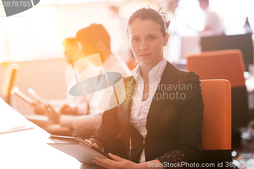 Image of business woman at  office people group on meeting  in background