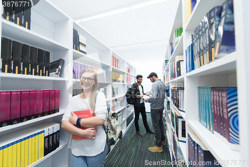 Image of students group  in school  library