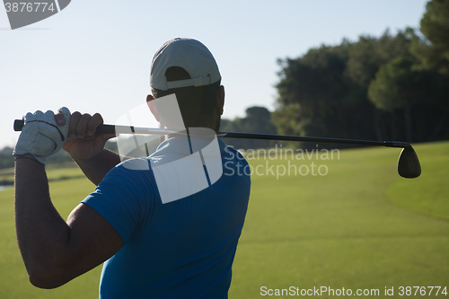 Image of golf player hitting shot