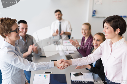 Image of business womans handshake