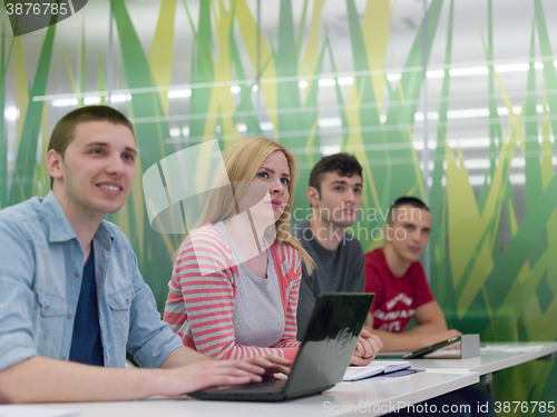 Image of group of students study together in classroom