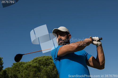 Image of golf player hitting shot