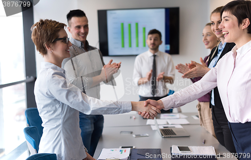 Image of business womans handshake