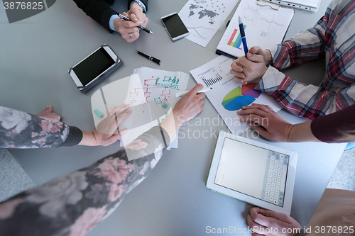 Image of top  view of business people group brainstorming on meeting