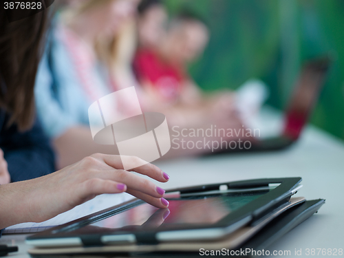 Image of group of students study together in classroom