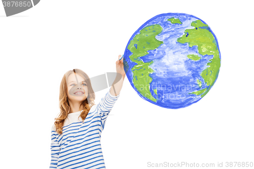 Image of girl drawing planet earth in the air