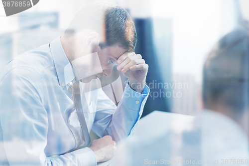 Image of business people having problem in office