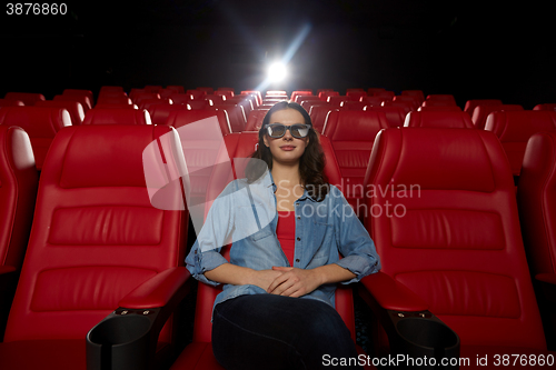 Image of young woman watching movie in 3d theater