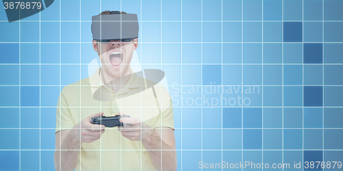 Image of angry man in virtual reality headset with gamepad