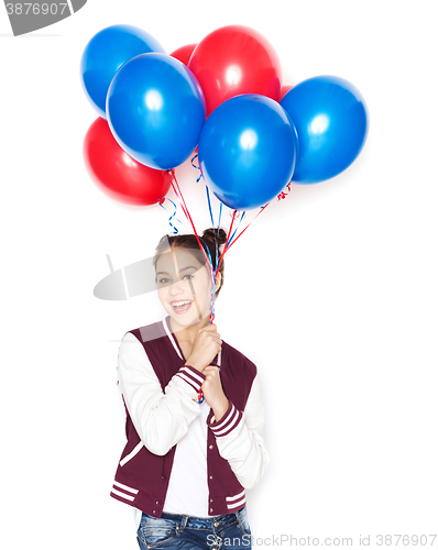 Image of happy teenage girl with helium balloons