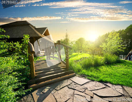 Image of Sunny sunset and house