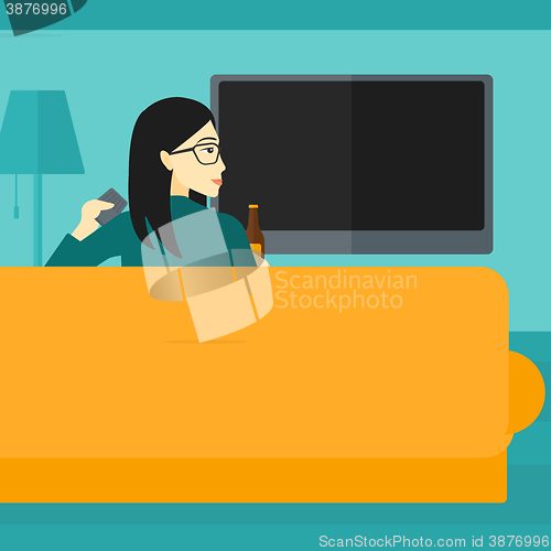 Image of Woman watching TV.