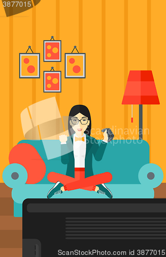 Image of Woman playing video game.