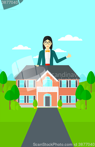 Image of Real estate agent showing thumb up.