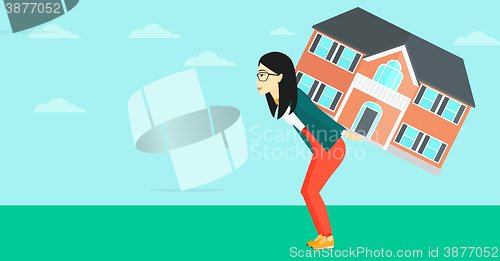 Image of Woman carrying house.