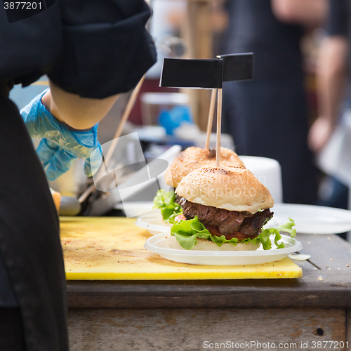 Image of Beef burgers ready to serve on food stall.