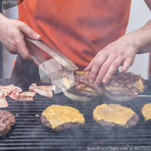 Image of Beef burgers ready to serve on food stall.