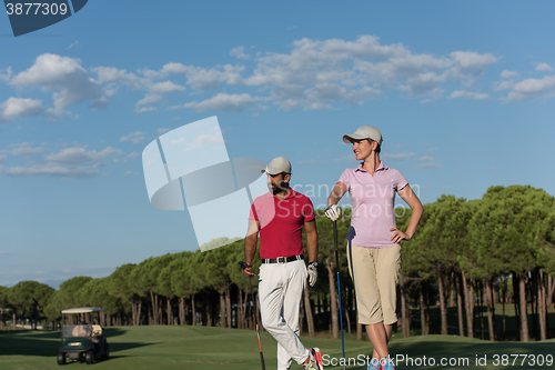 Image of portrait of couple on golf course