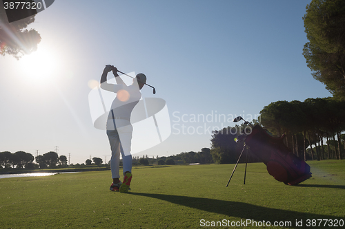 Image of golf player hitting shot