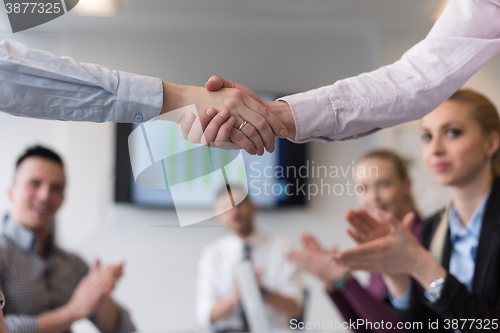 Image of business womans handshake