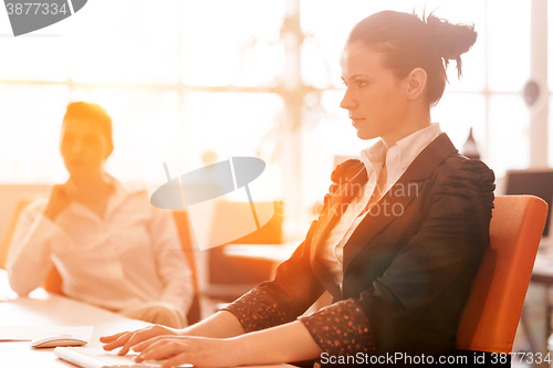 Image of business woman at  office people group on meeting  in background