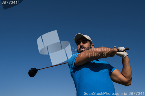 Image of golf player hitting shot