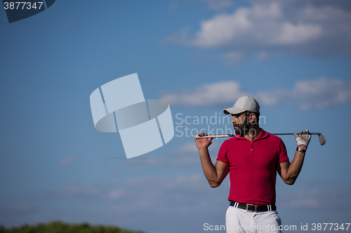 Image of handsome middle eastern golf player portrait at course