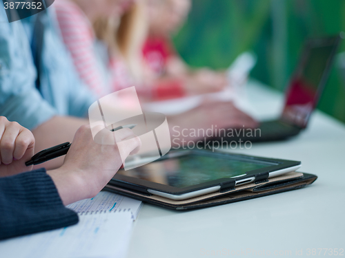 Image of group of students study together in classroom