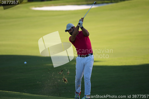 Image of golf player hitting long shot