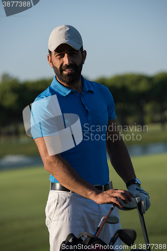 Image of golfer  portrait at golf course