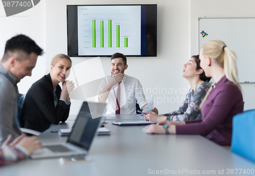 Image of young business people group on meeting at office