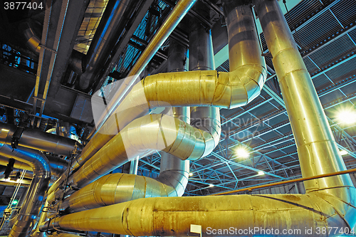 Image of Equipment, cables and piping as found inside of a modern industr