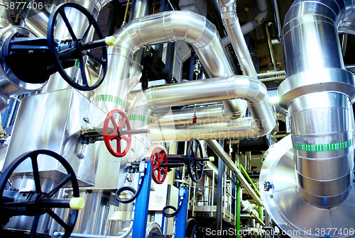 Image of Equipment, cables and piping as found inside of a modern industr