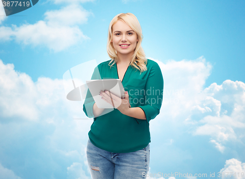 Image of smiling woman with tablet pc computer